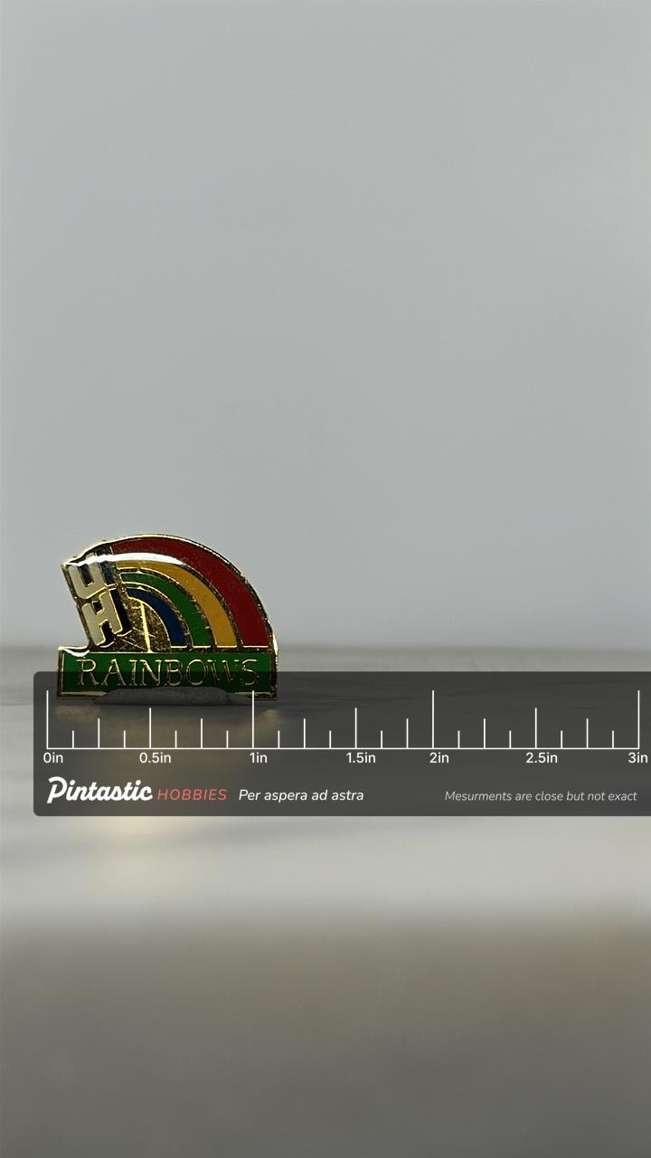 4H Rainbows Enamel Pin: Gold Tone Rainbow - Vintage Youth Organization Accessory with ruler overlay for size reference