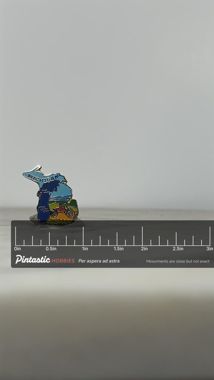 Michigan State Enamel Pin: Multicolor Souvenir - Vintage Travel Accessory with ruler overlay for size reference