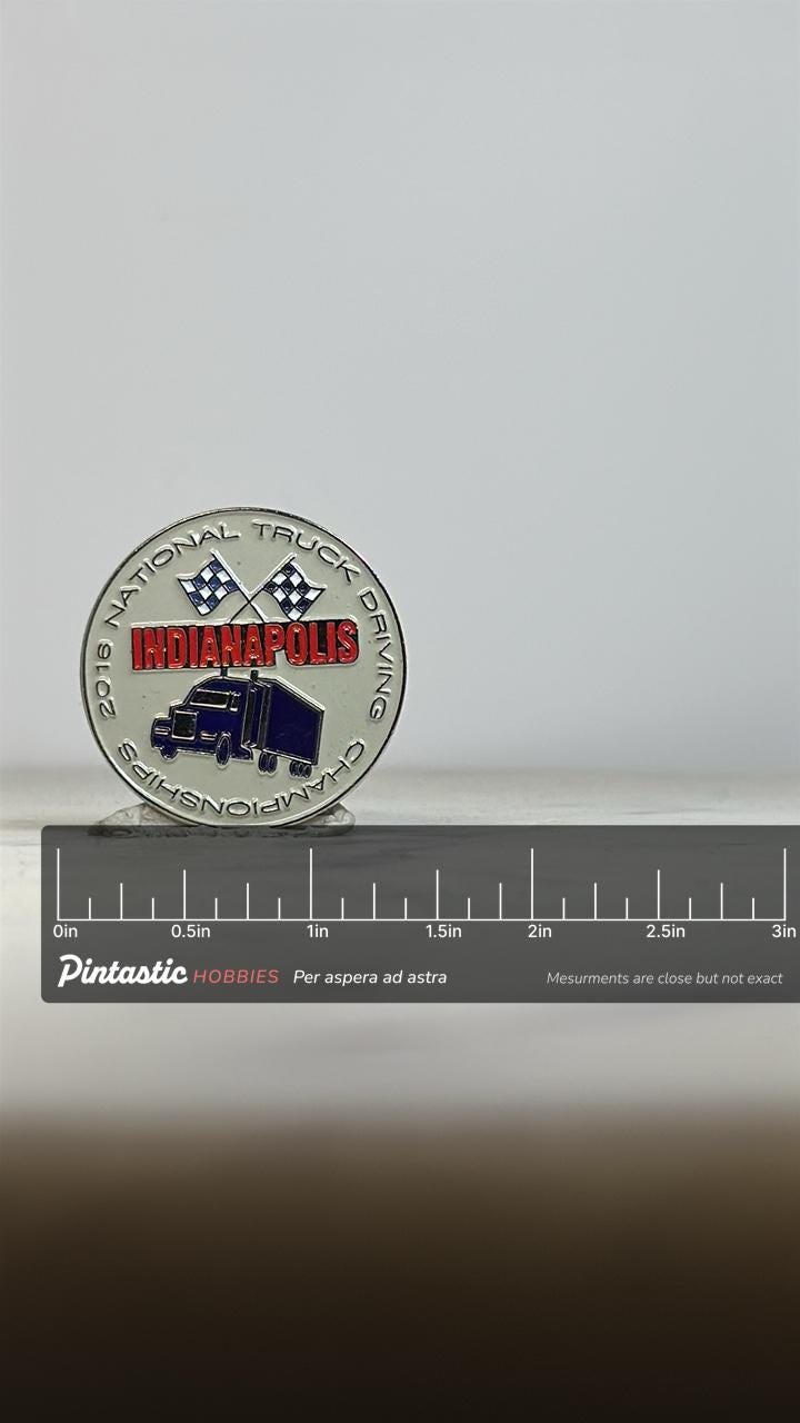 Indianapolis Truck Driving Pin: Silver Enamel Finish - 2016 Championship Accessory with ruler overlay for size reference