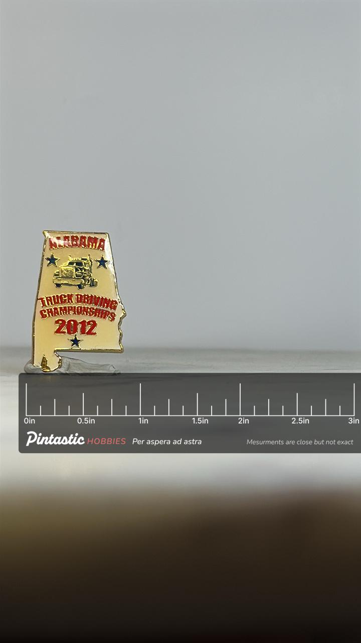 Alabama Truck Driving Pin: Gold & Red Enamel - 2012 Championship Accessory with ruler overlay for size reference