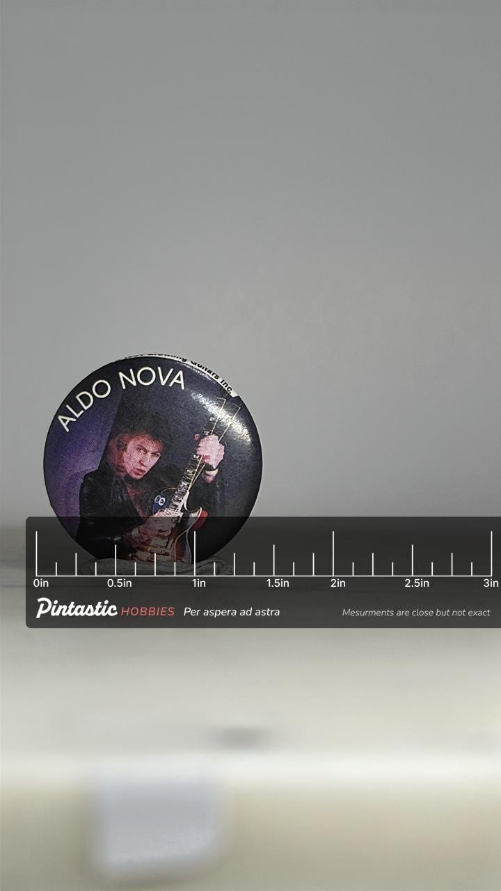 Aldo Nova Band Pin: Glossy Photo Button - 1980s Rock Accessory with ruler overlay for size reference
