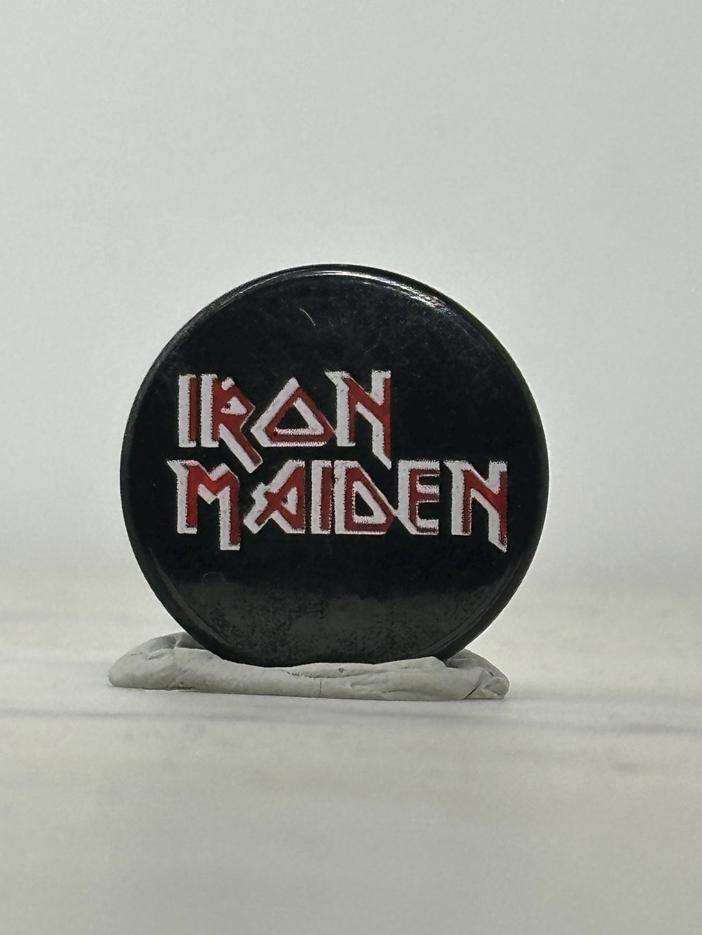 Iron Maiden Band Pin: Black & Red Logo - Vintage Rock Accessory