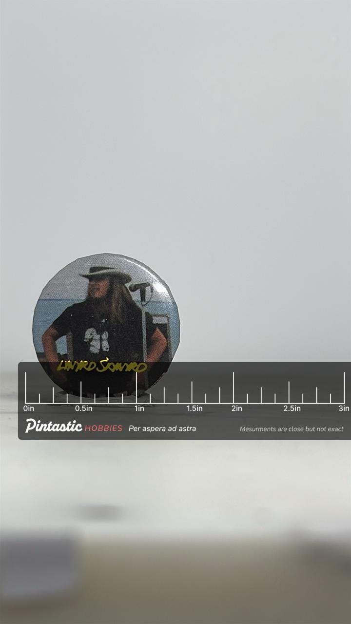 Lynyrd Skynyrd Band Pin: Glossy Photo Style - Vintage Rock Accessory with ruler overlay for size reference