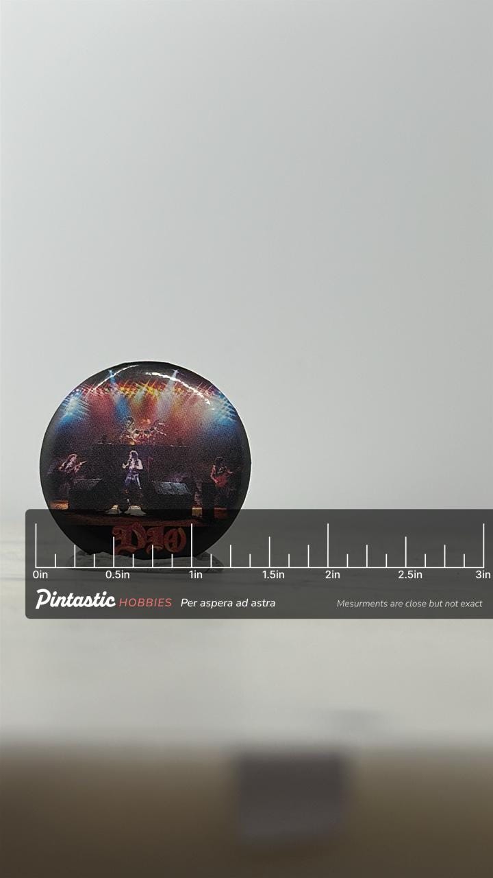 DIO Band Button Pin: Glossy Concert Image - Vintage Rock Accessory with ruler overlay for size reference