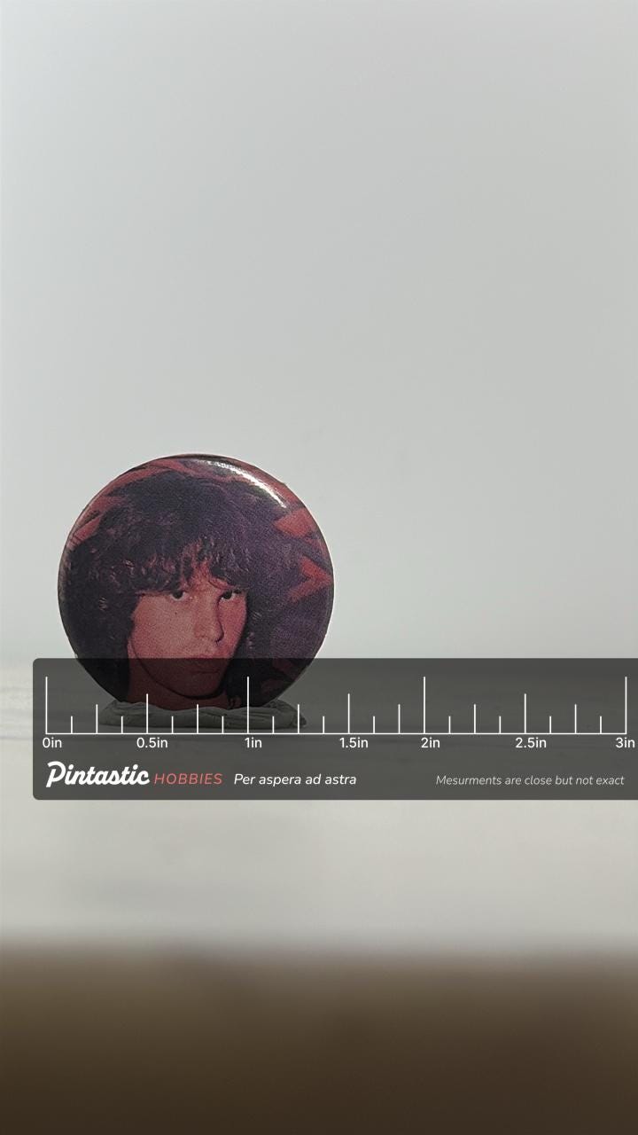 Jim Morrison Photo Button Pin: Glossy Finish - 1970s Rock Accessory with ruler overlay for size reference