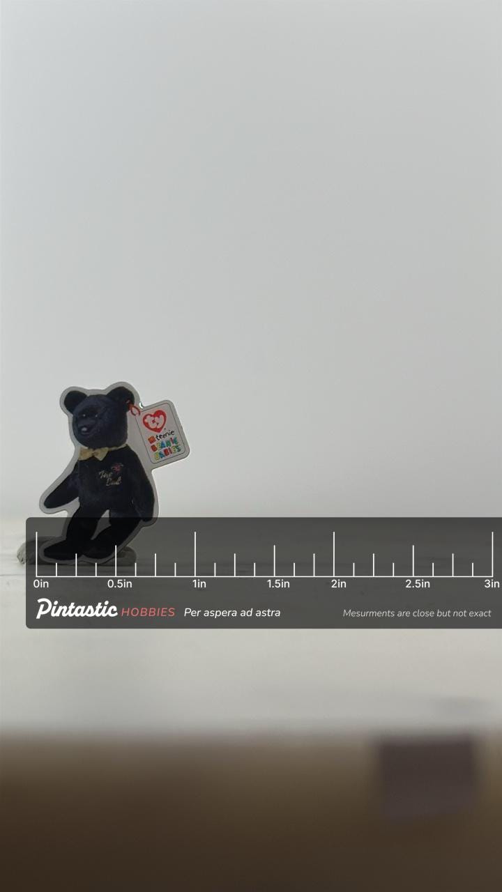 Ty Beanie Baby Bear Pin: Black Enamel - 90s Nostalgia Accessory with ruler overlay for size reference