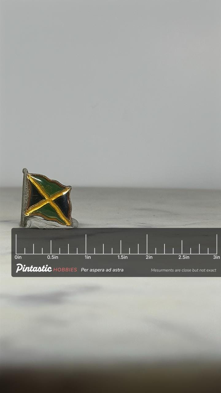 Jamaica Flag Enamel Pin: Gold Trim Cloisonné - Vintage Travel Accessory with ruler overlay for size reference