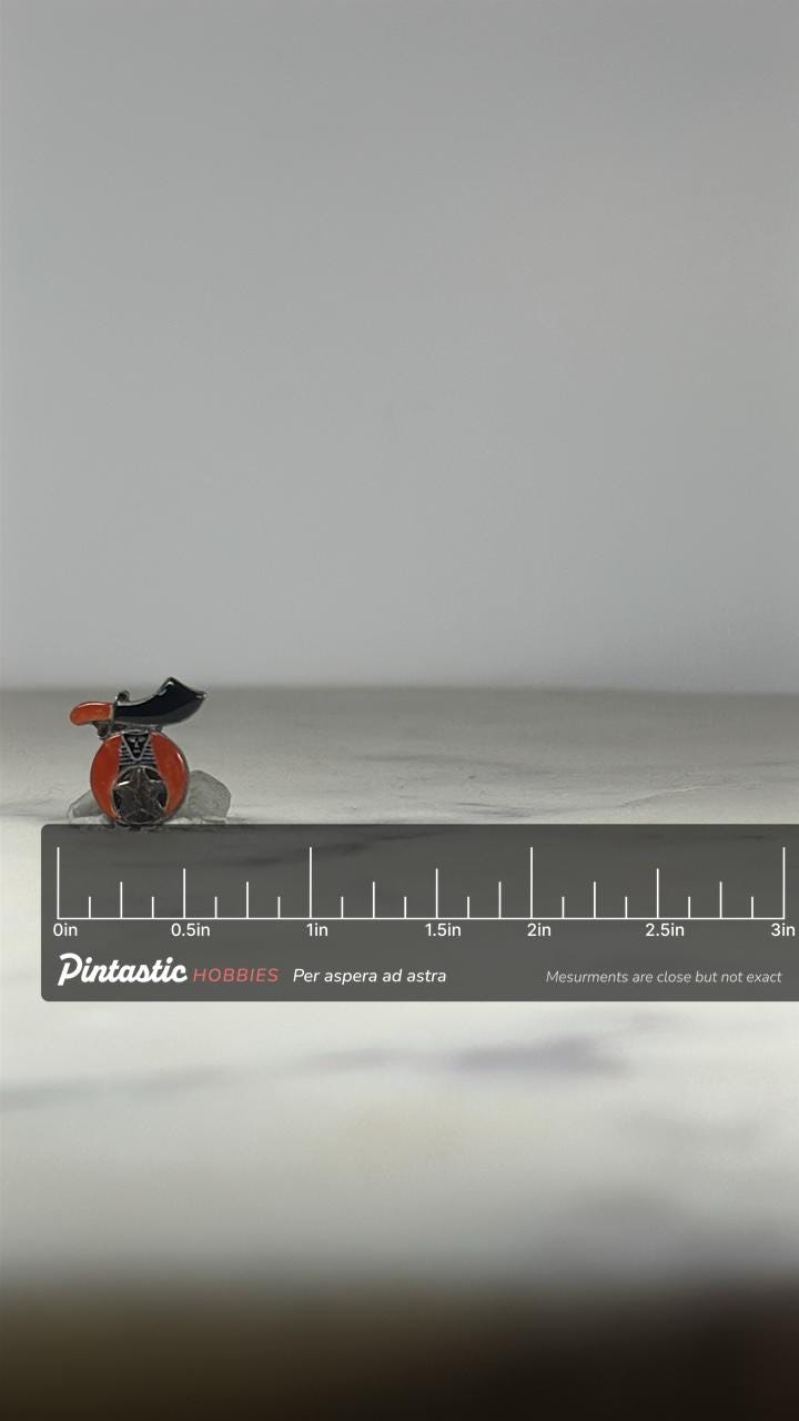 Shriner Scimitar Enamel Pin: Red Black Silver - Vintage Fraternal Accessory with ruler overlay for size reference