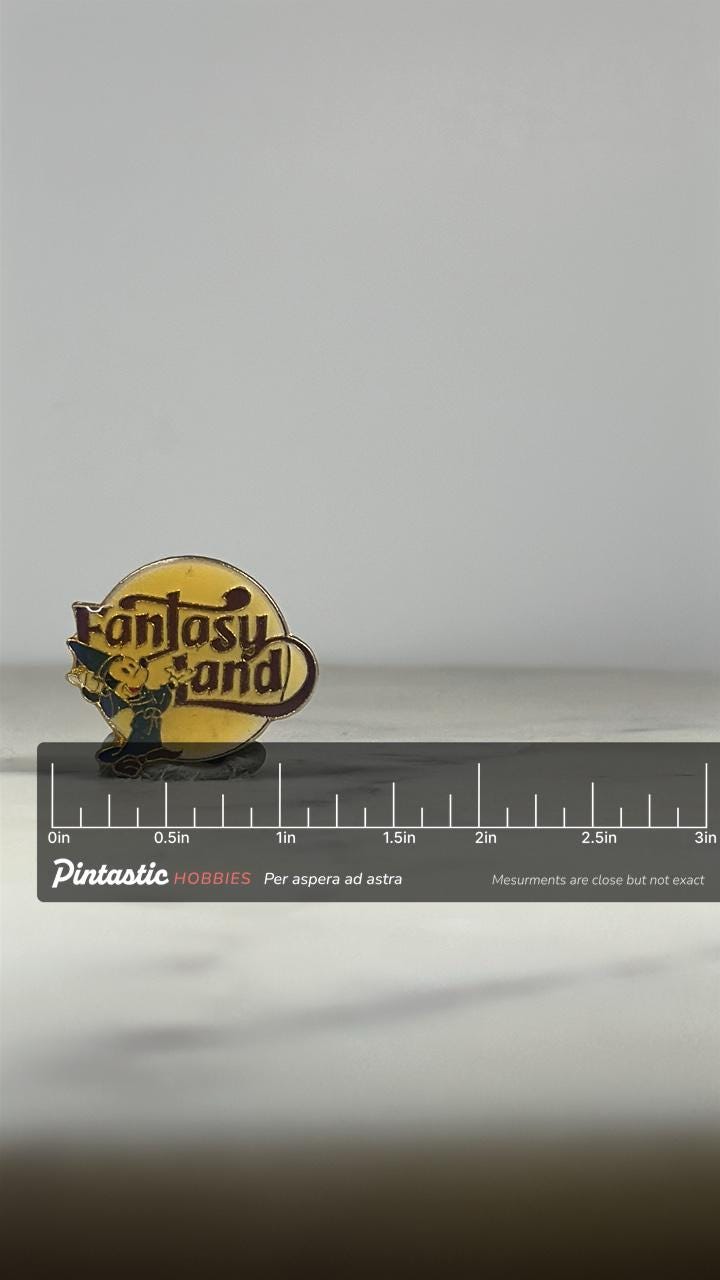 Fantasyland Enamel Pin: Sorcerer Mickey Yellow - Vintage Disney Accessory with ruler overlay for size reference