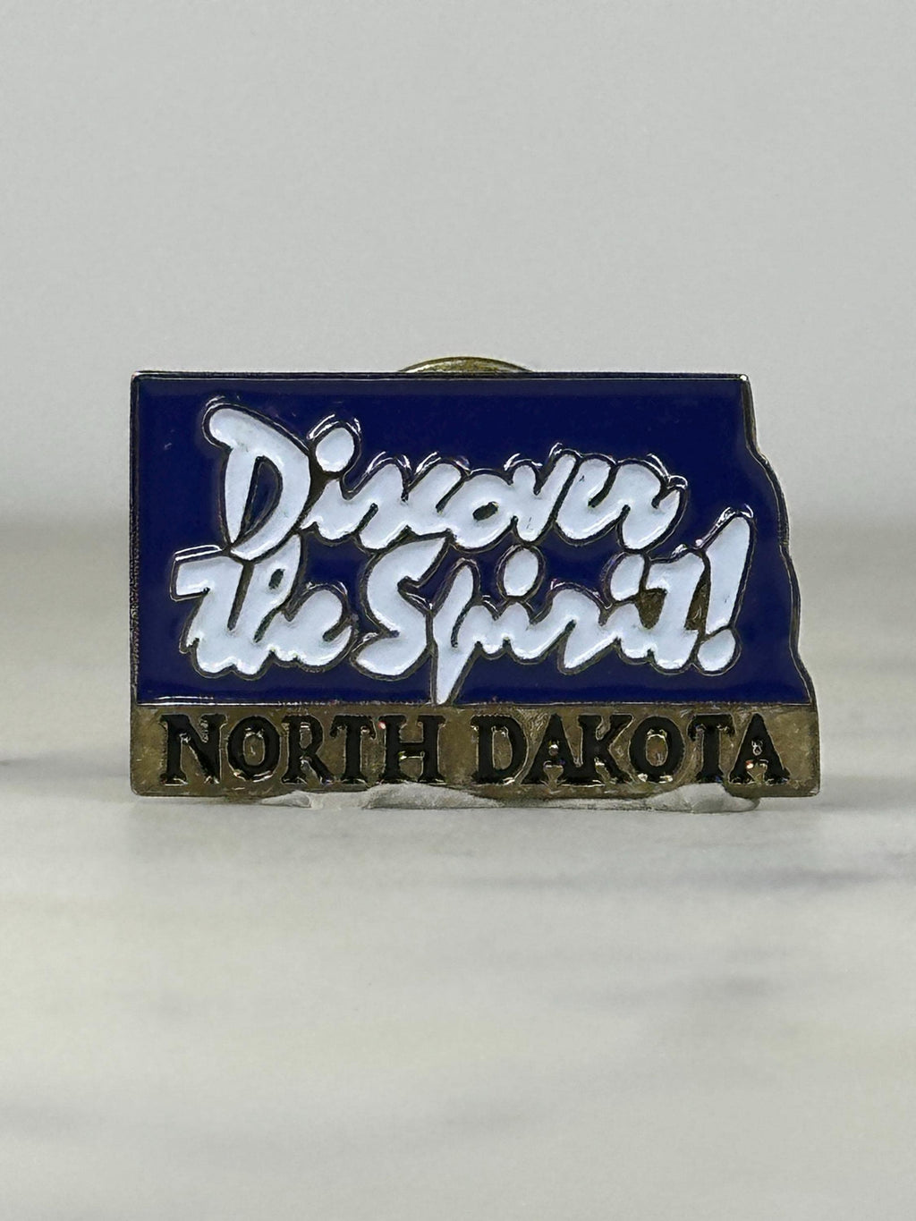 North Dakota State Pin: Blue Enamel Brass Finish - Vintage Travel Accessory