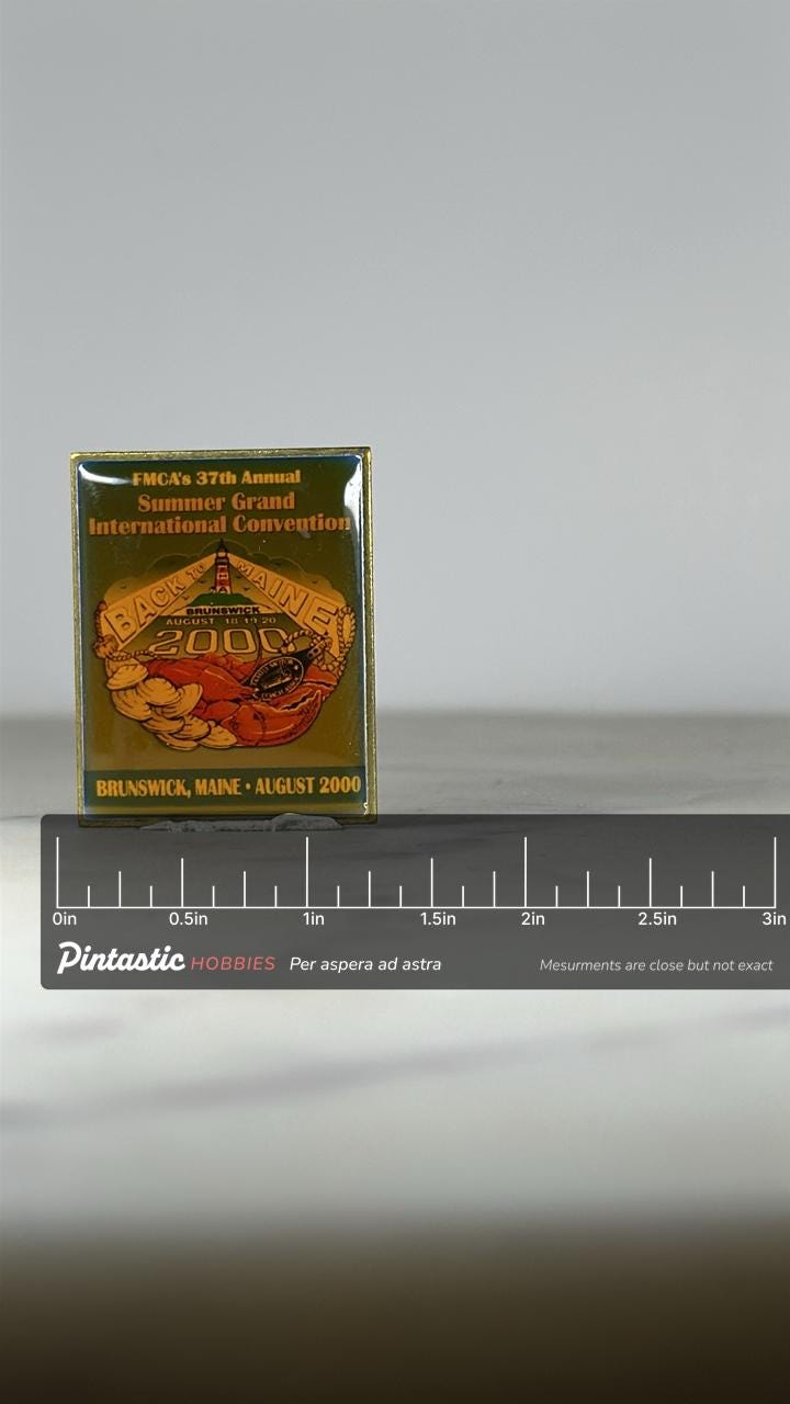 FMCA Summer Convention Pin: Gold & Red Enamel - 2000 Event Accessory with ruler overlay for size reference