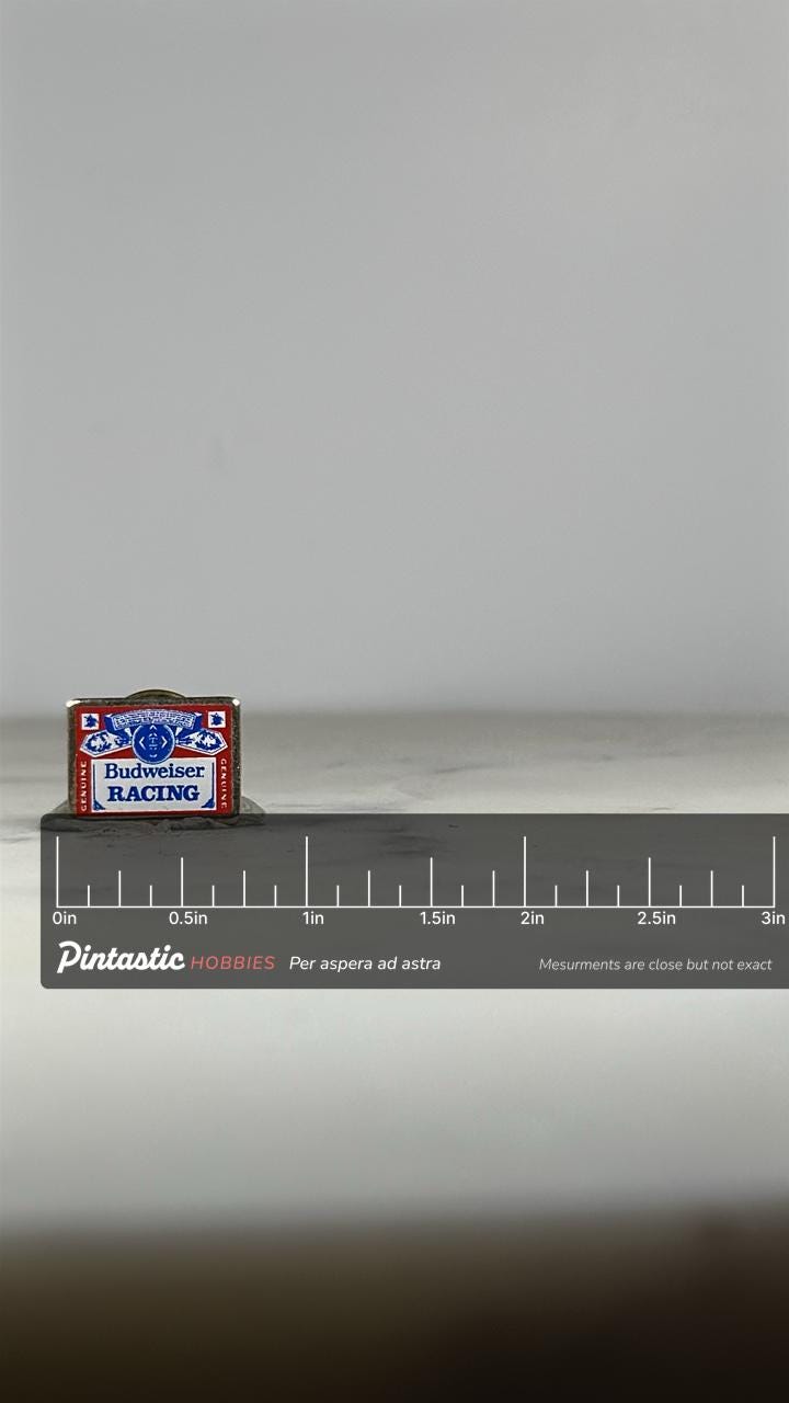 Budweiser Racing Enamel Pin: Red White Blue - Vintage Sports Accessory with ruler overlay for size reference