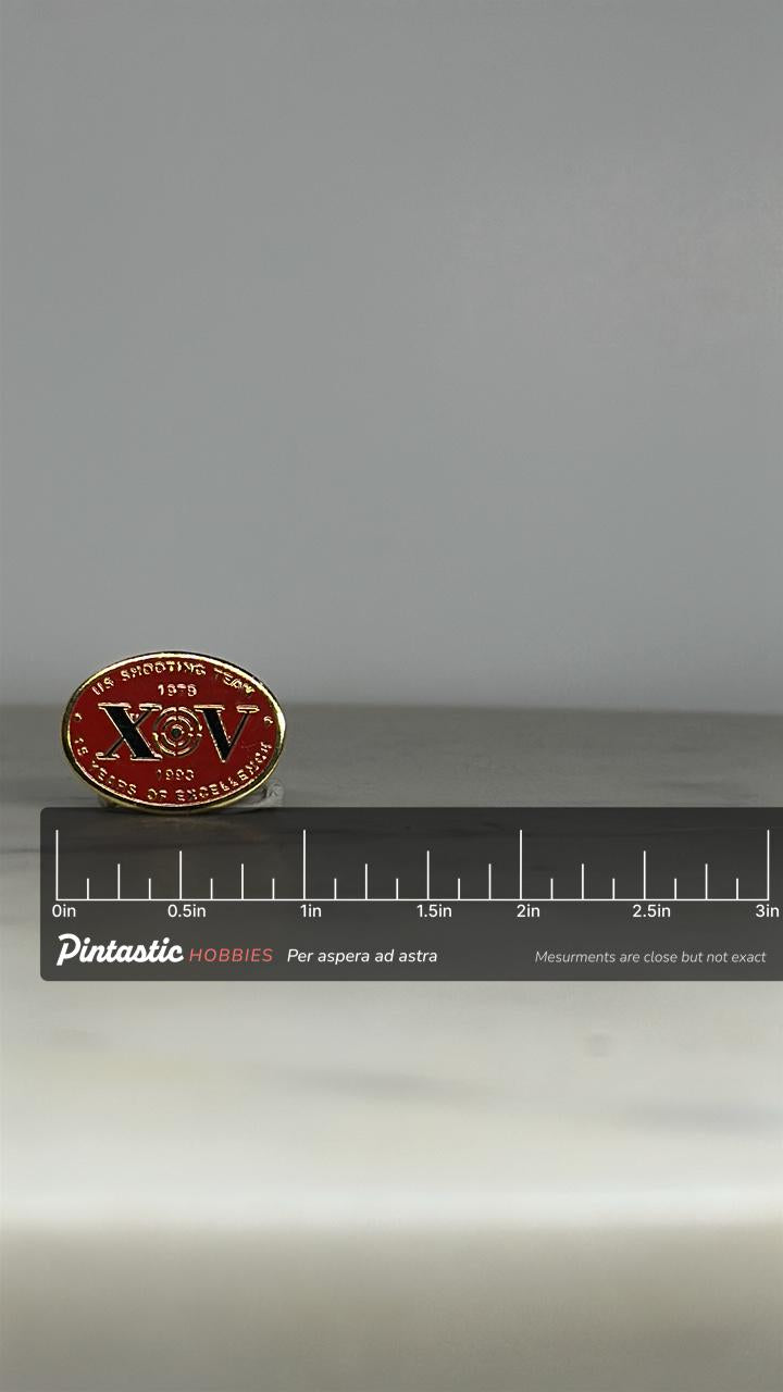 US Shooting Team Enamel Pin: Red Gold Finish - 1990s Sports Accessory with ruler overlay for size reference