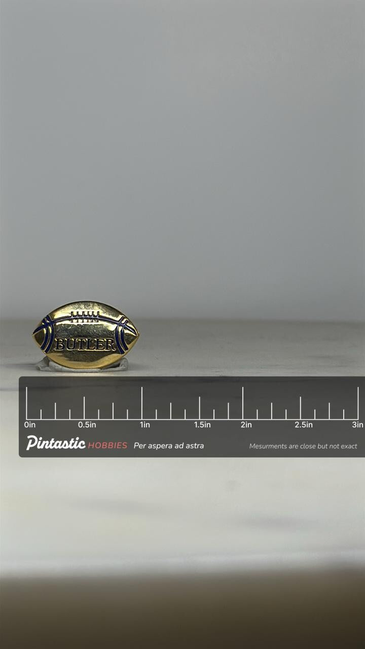 Butler Football Enamel Pin: Gold & Blue Finish - Vintage Sports Accessory with ruler overlay for size reference