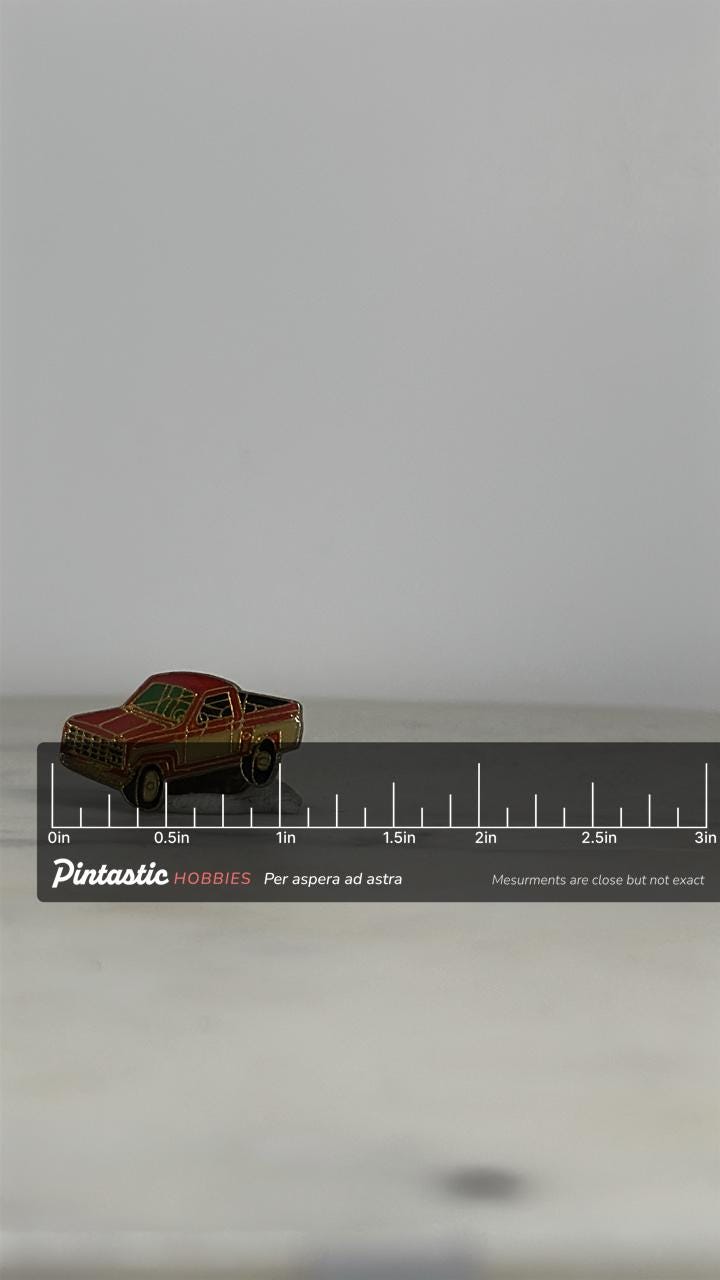 Red Pickup Truck Enamel Pin: Gold Trim Detail - Retro Car Accessory with ruler overlay for size reference