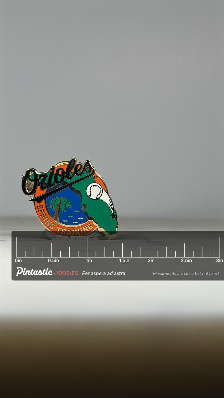 Orioles Spring Training Pin: Bold Colors Enamel - Vintage Baseball Accessory with ruler overlay for size reference