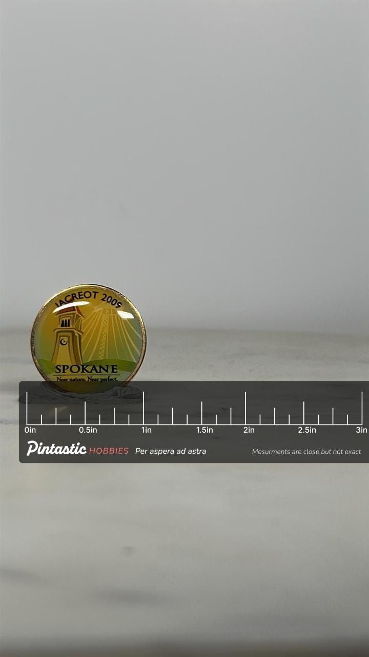 Spokane Enamel Pin: Gold-Tone Landmark Design - 2009 Souvenir Accessory with ruler overlay for size reference