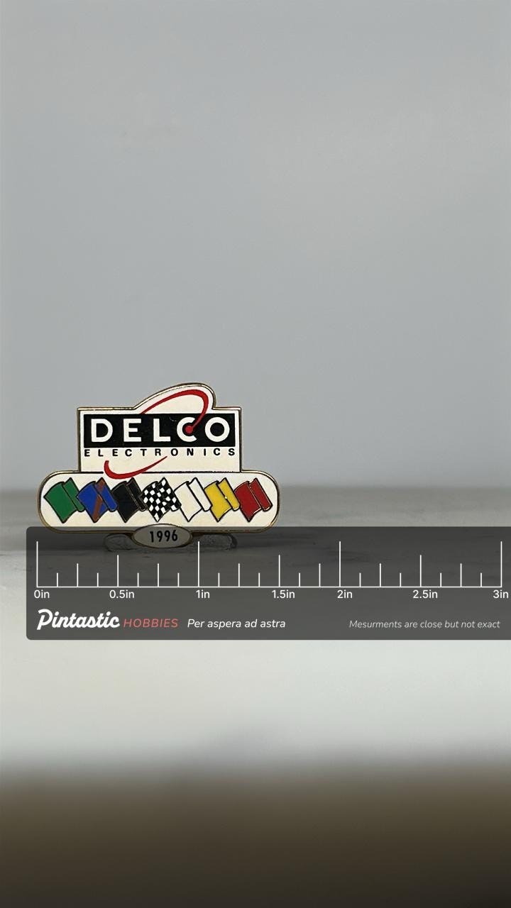 Delco Electronics Racing Pin: Multicolor Enamel - 1996 Collectible Accessory with ruler overlay for size reference