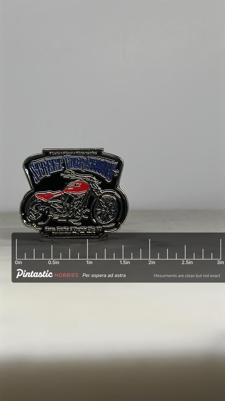 Street Vibrations Motorcycle Pin: Red & Silver Enamel - 2012 Rally Accessory with ruler overlay for size reference