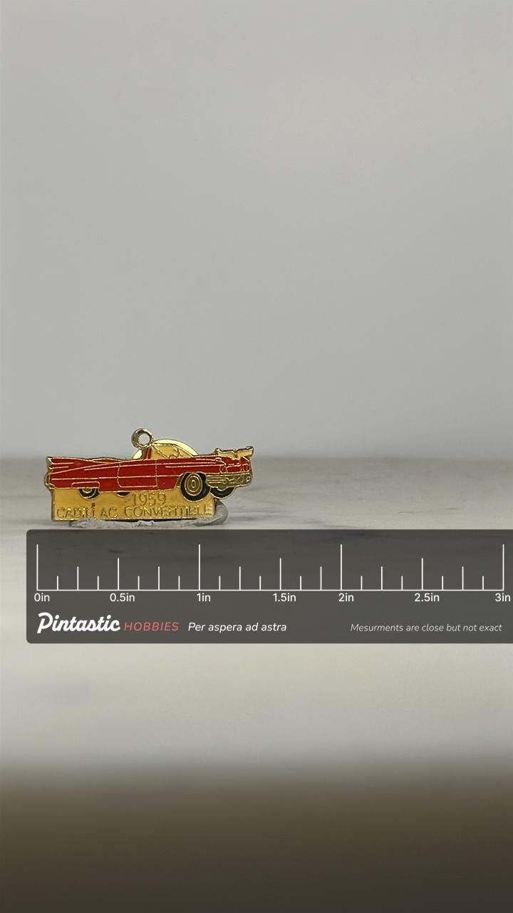 1959 Cadillac Convertible Pin: Red Gold Enamel - Retro Car Accessory with ruler overlay for size reference