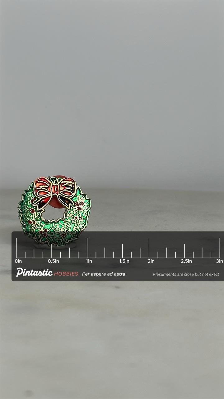 Christmas Wreath Enamel Pin: Red Green Gold Finish - Holiday Accessory with ruler overlay for size reference