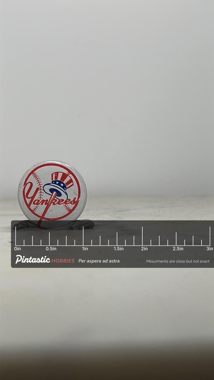 Yankees Baseball Pinback Button: Red White Blue Logo - Vintage Sports Accessory with ruler overlay for size reference