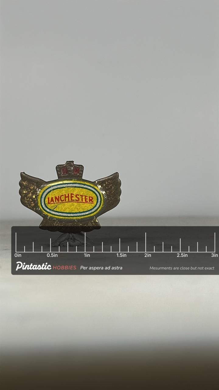 Lanchester Car Club Pin: Yellow Enamel Winged Badge - Vintage Auto Accessory with ruler overlay for size reference