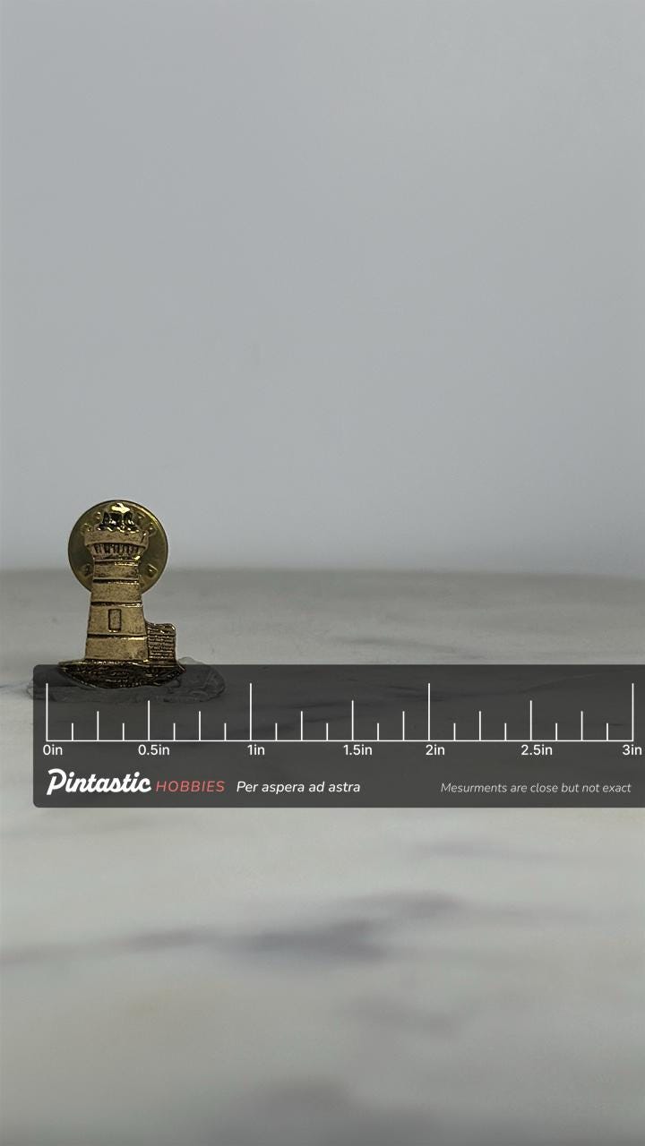 Lighthouse Enamel Pin: Gold Tone Metal - Nautical Vintage Accessory with ruler overlay for size reference