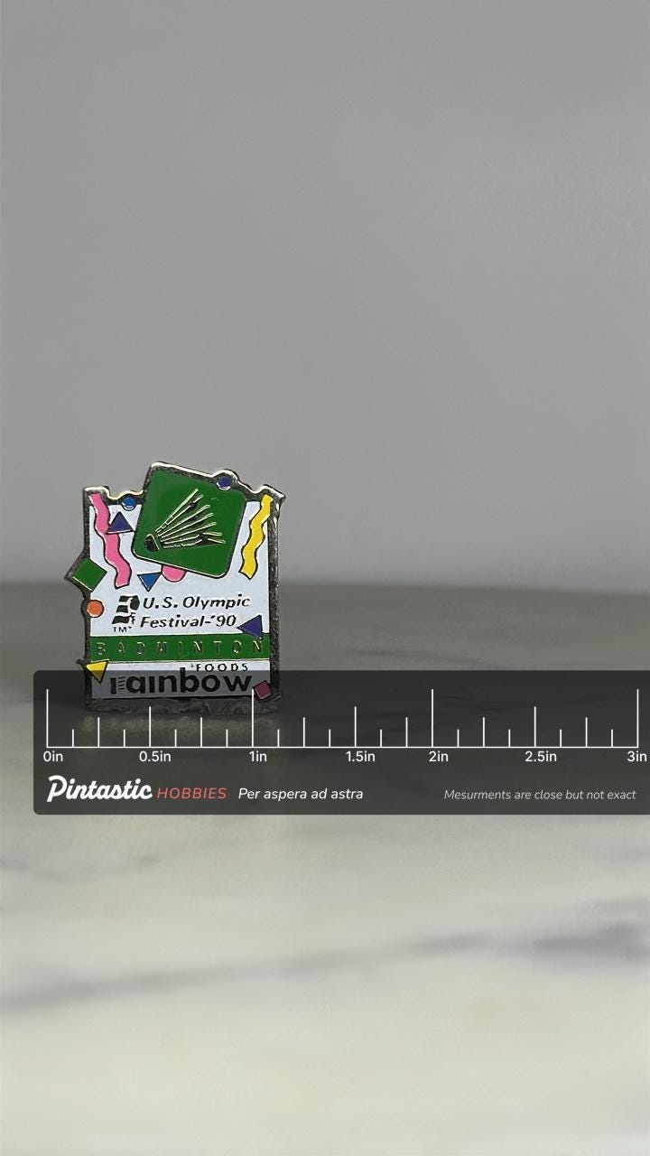 Olympic Badminton Enamel Pin: Multicolor 1990 - Vintage Sports Accessory with ruler overlay for size reference