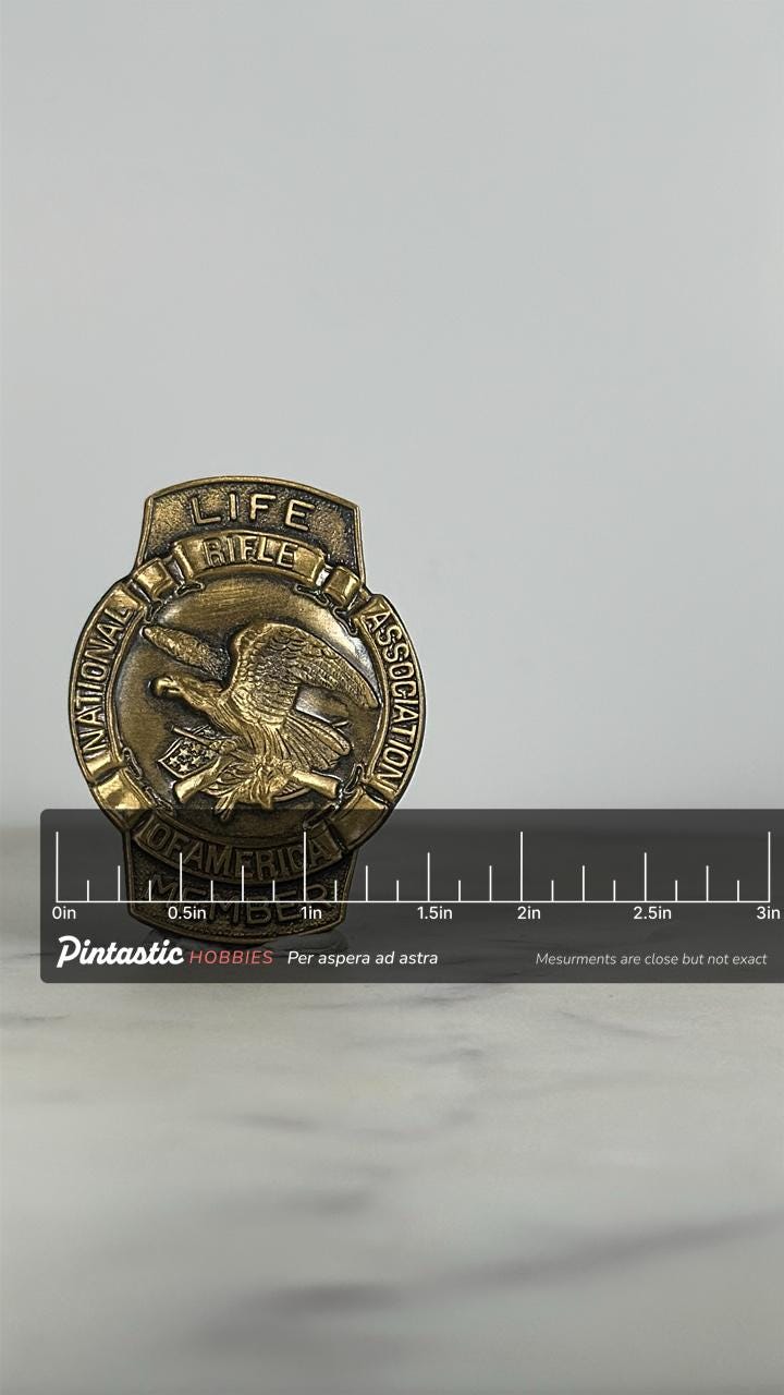 NRA Life Member Pin: Antique Brass Finish - Patriotic Accessory with ruler overlay for size reference