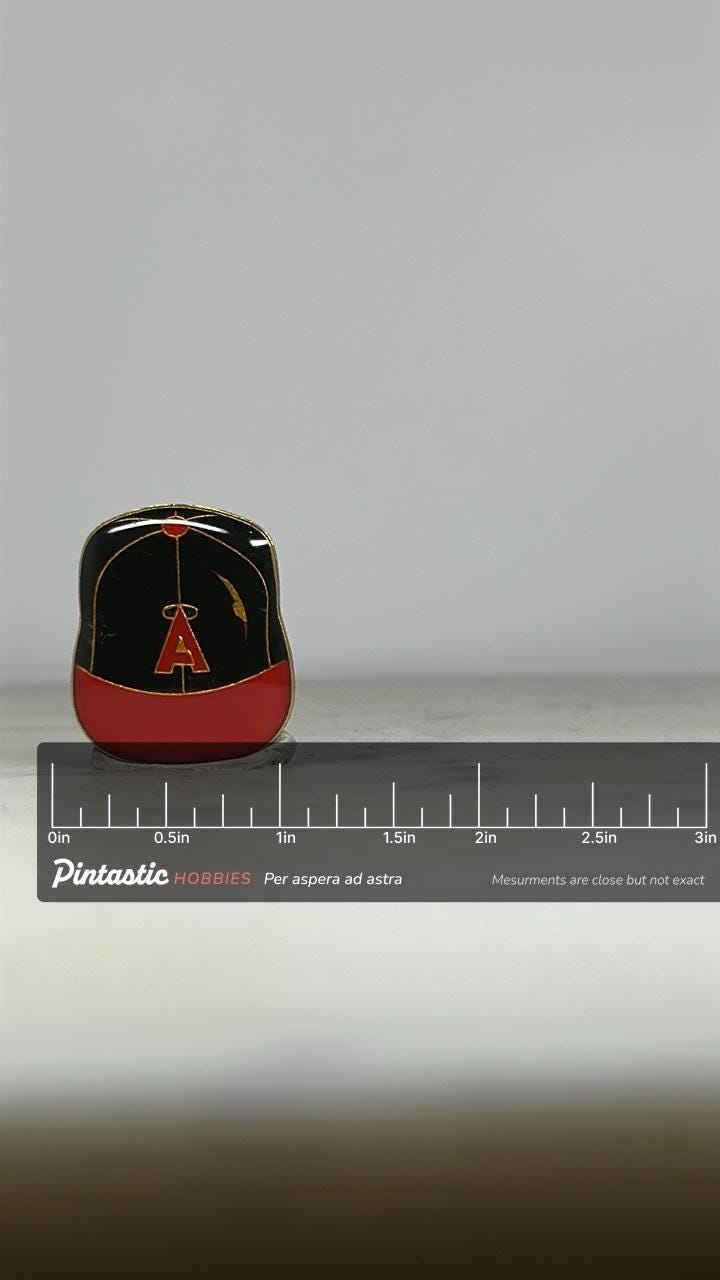 Angels Baseball Hat Pin: Red & Black Enamel - Vintage Sports Accessory with ruler overlay for size reference