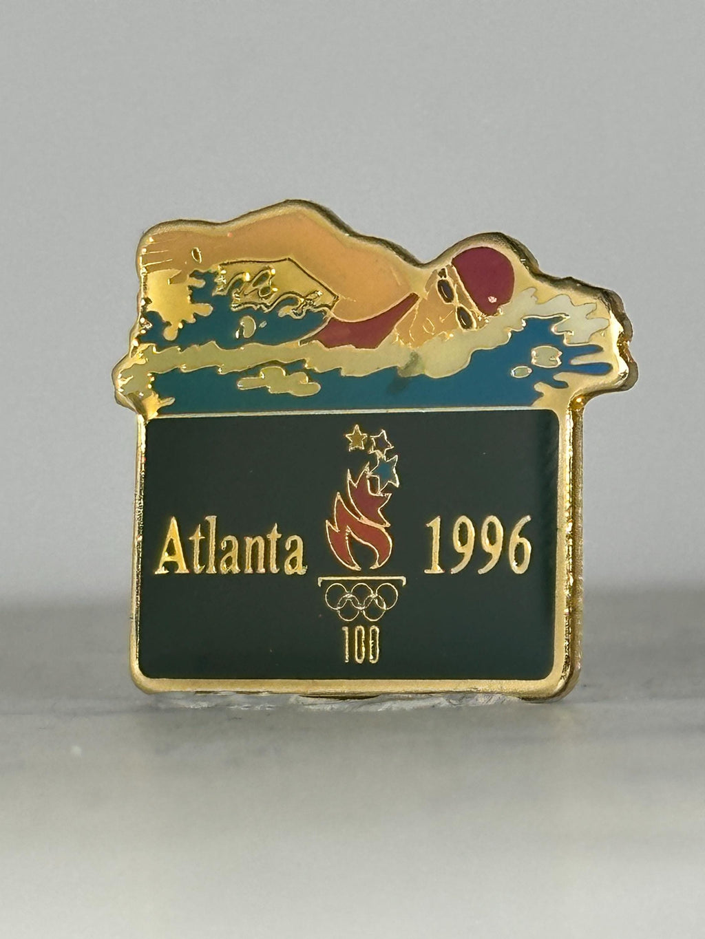 Atlanta Olympics Swimming Pin: Gold Enamel Finish - 1996 Sports Accessory