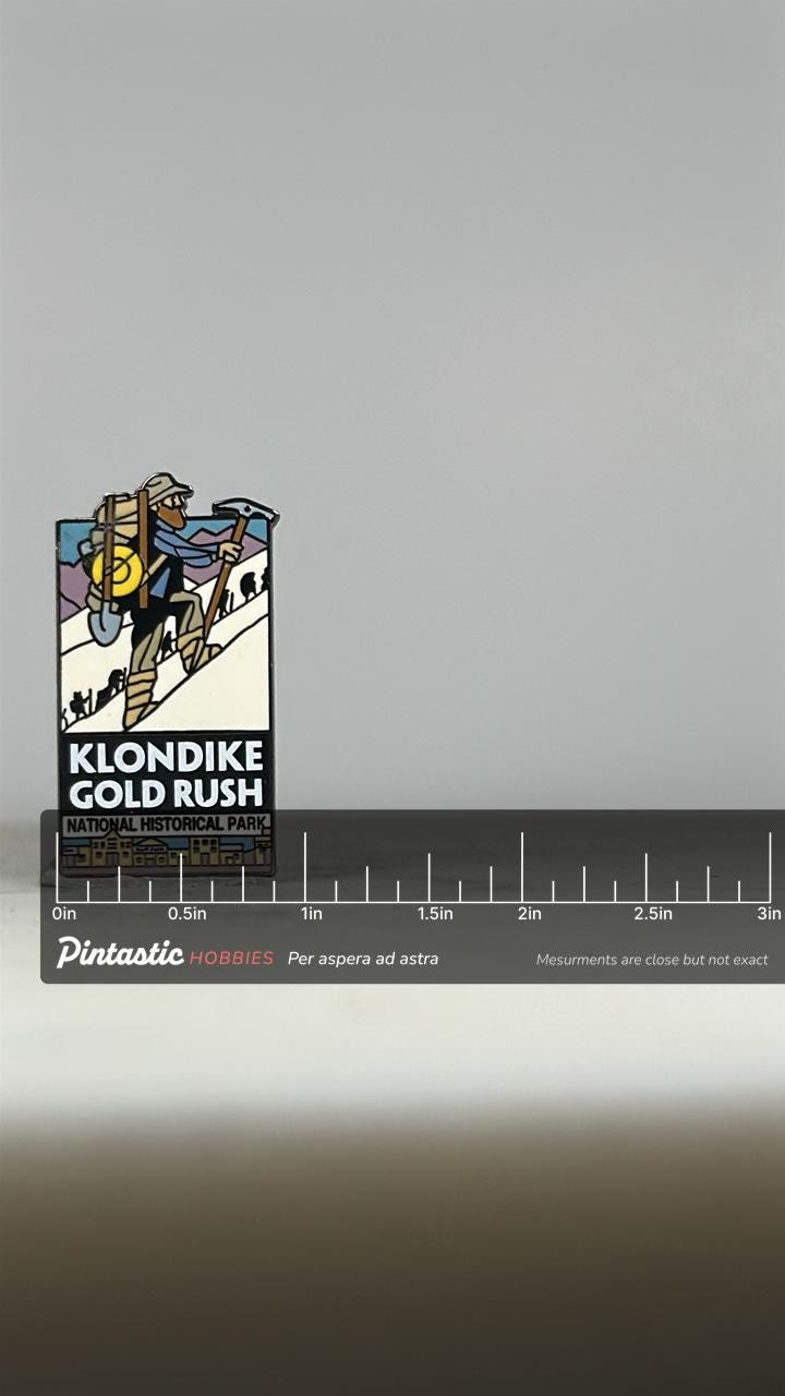 Klondike Gold Rush Enamel Pin: Colorful Hiker Scene - Vintage Park Accessory with ruler overlay for size reference