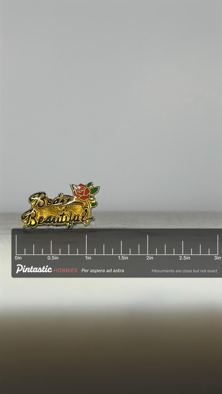 Body Beautiful Enamel Pin: Gold & Red Rose Finish - Vintage Affirmation Accessory with ruler overlay for size reference
