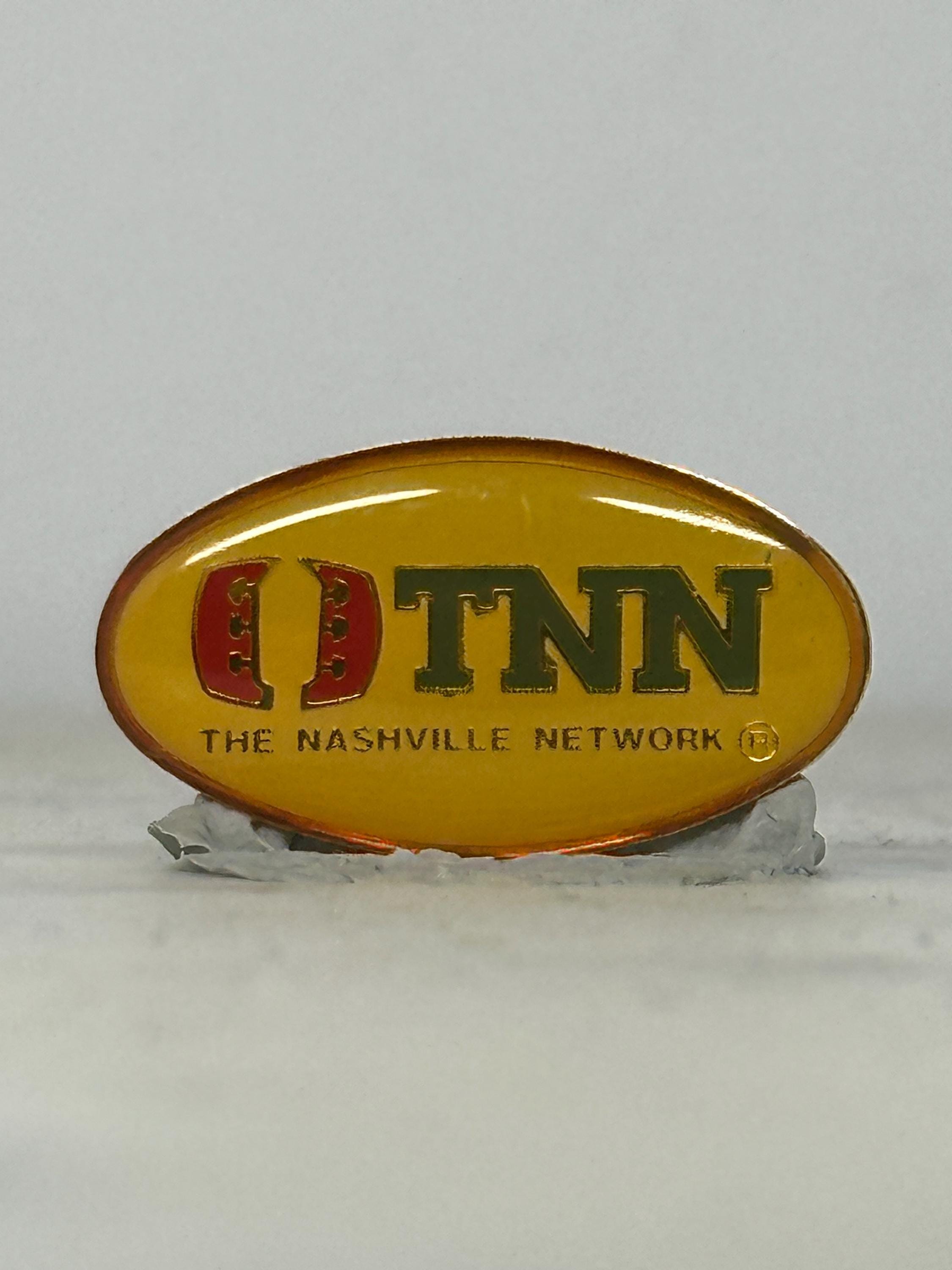 TNN Enamel Pin: Yellow Oval Logo - Vintage TV Accessory