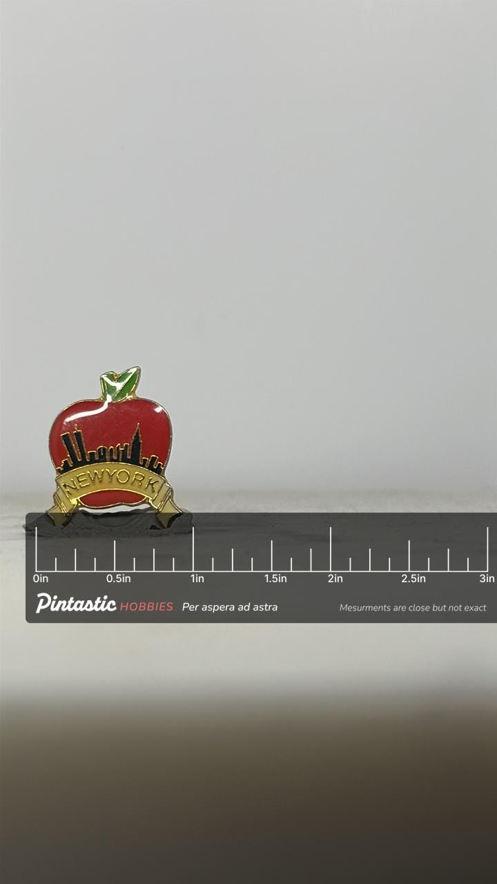 New York City Skyline Pin: Red Apple Enamel - Vintage Souvenir Accessory with ruler overlay for size reference