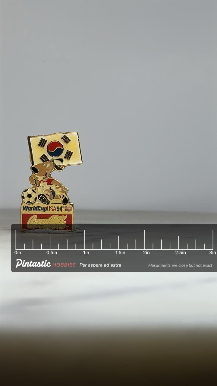 World Cup USA 94 Enamel Pin: Coca-Cola Korea Flag - 90s Sports Accessory with ruler overlay for size reference