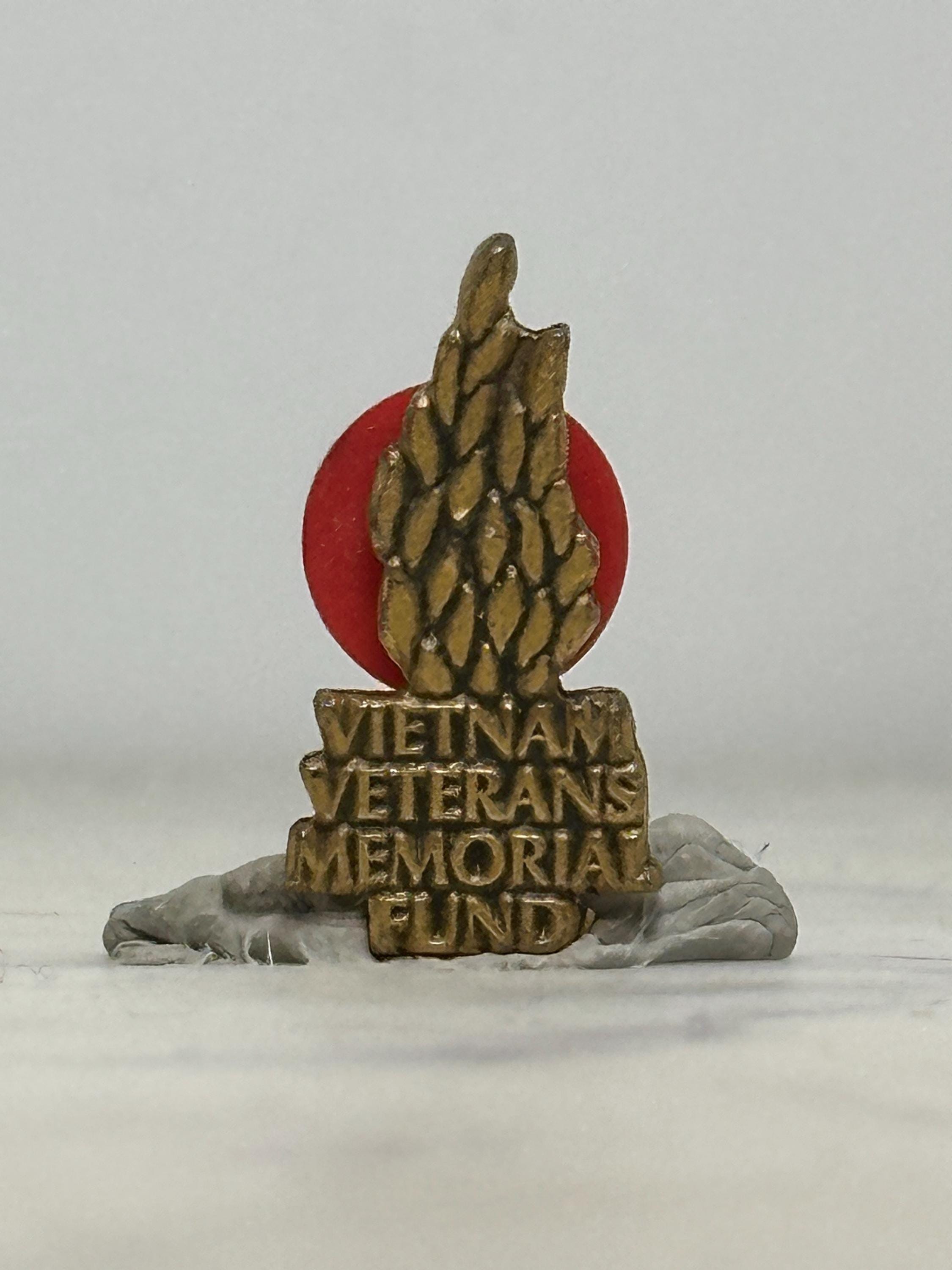 Vietnam Veterans Memorial Fund Pin: Bronze Red Flame - Military Tribute Accessory