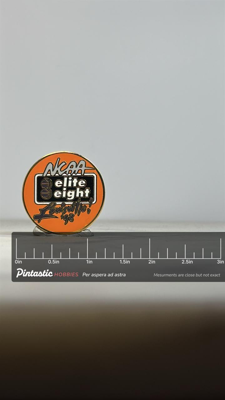 NCAA Elite Eight Pin: Orange Black Enamel - 1998 Sports Accessory with ruler overlay for size reference