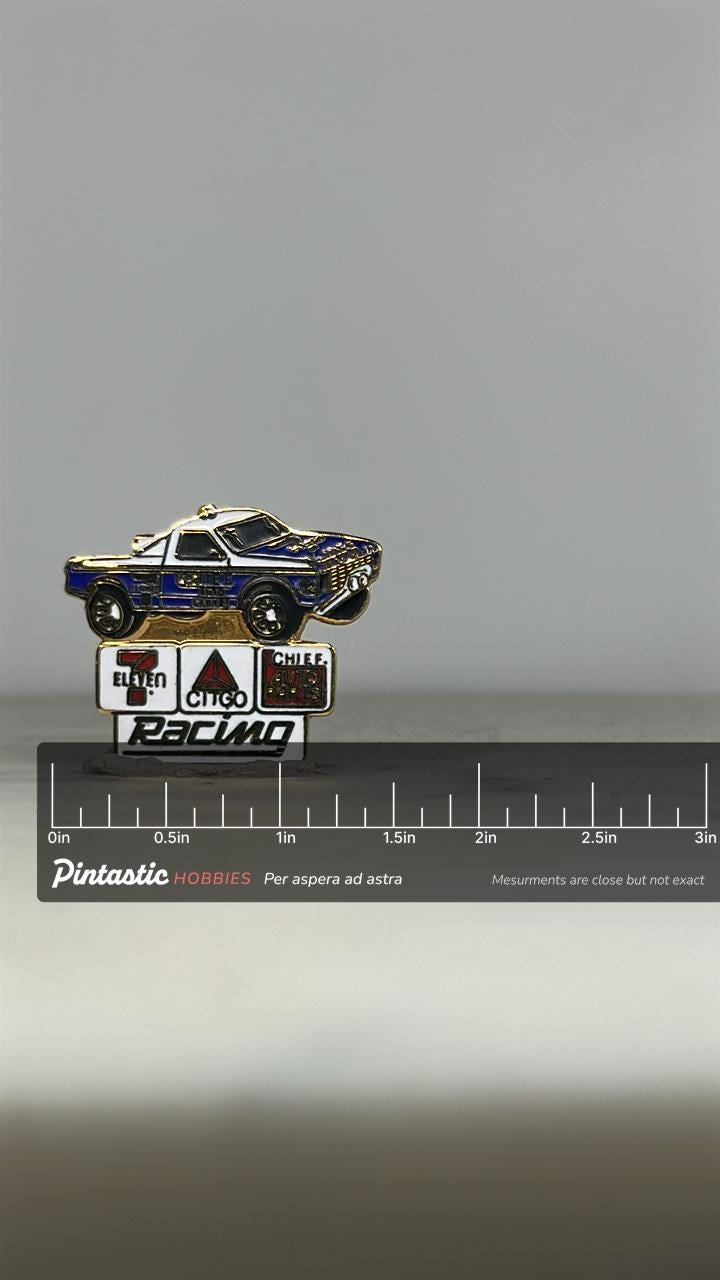 Racing Truck Enamel Pin: Blue & White - Vintage Motorsports Accessory with ruler overlay for size reference