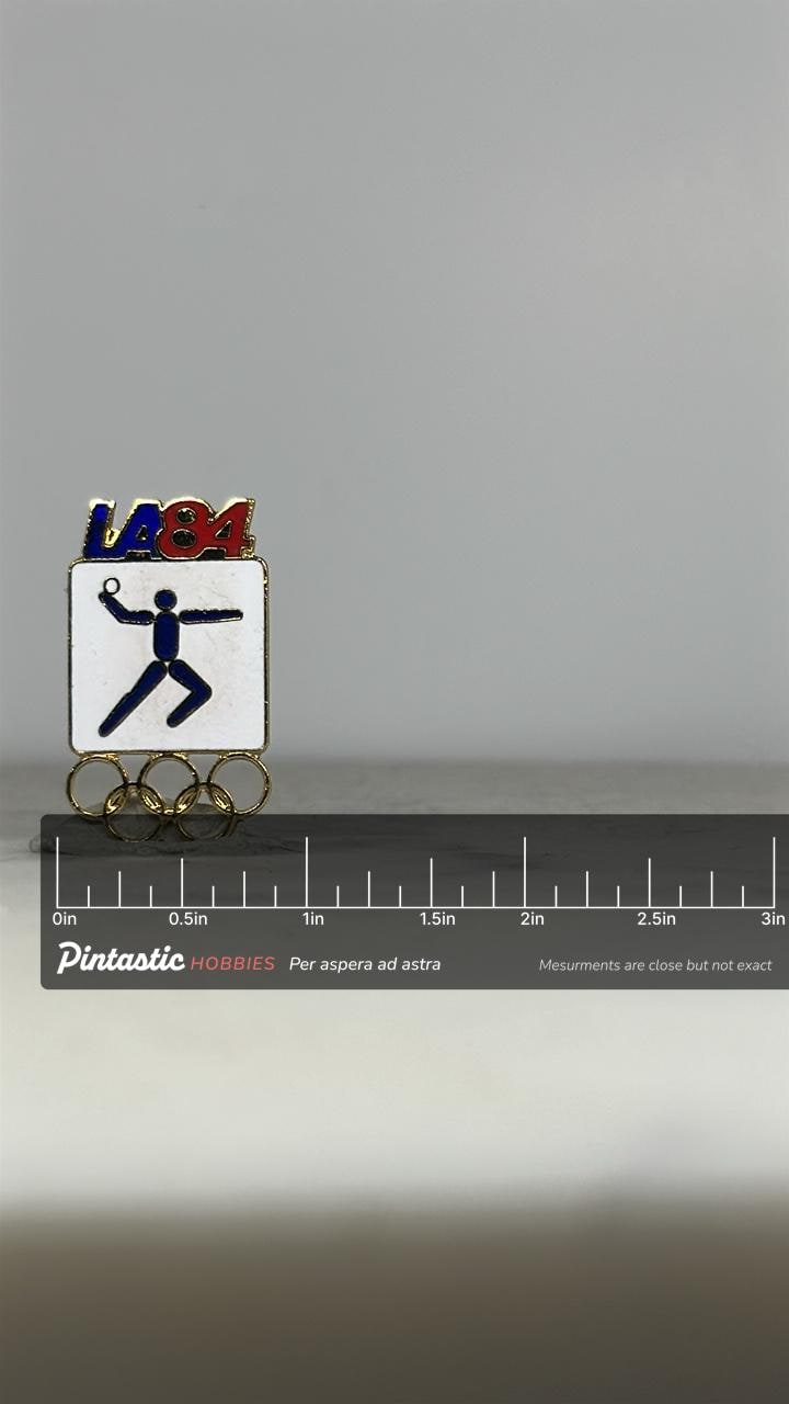 LA84 Olympic Handball Pin: Red Blue Enamel Gold Trim - 1984 Games Accessory with ruler overlay for size reference