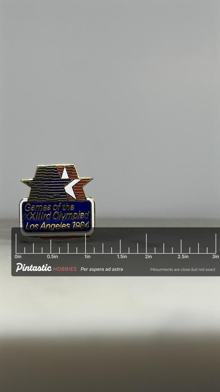 1984 Olympics Enamel Pin: Red White Blue Gold - Los Angeles Games Accessory with ruler overlay for size reference
