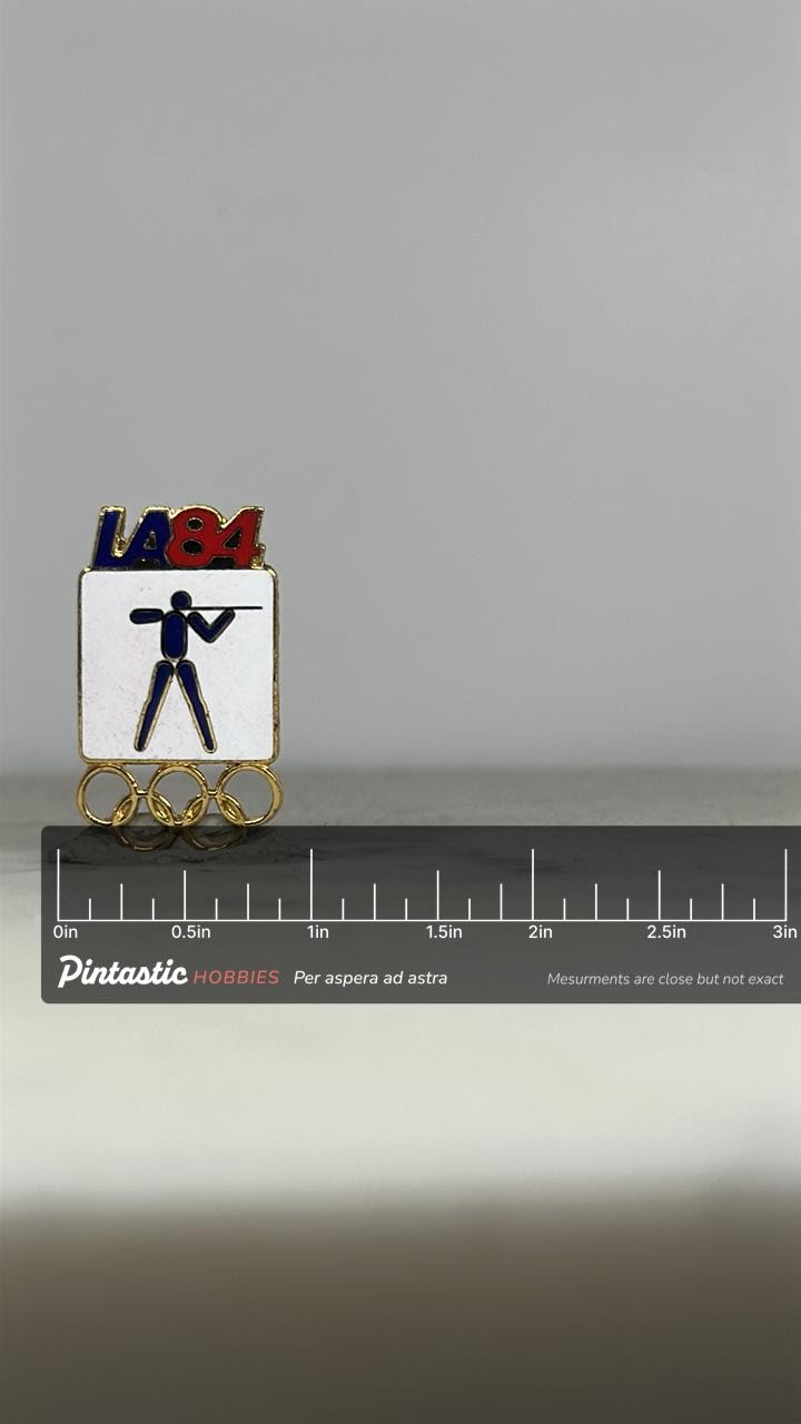 LA84 Olympic Shooting Pin: Gold Enamel – 1984 Games Accessory with ruler overlay for size reference