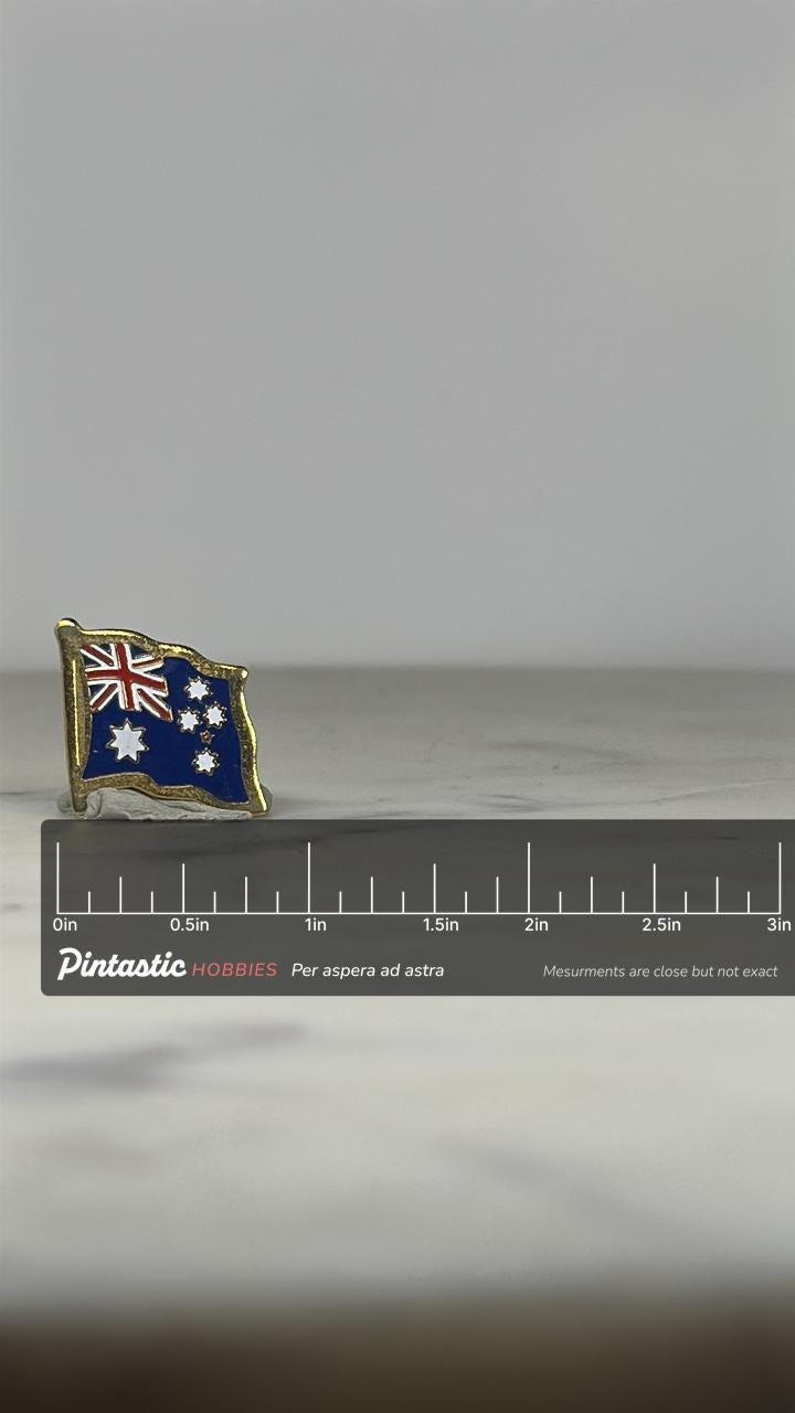 Australia Flag Enamel Pin: Gold Trim Blue Red - Patriotic Accessory with ruler overlay for size reference