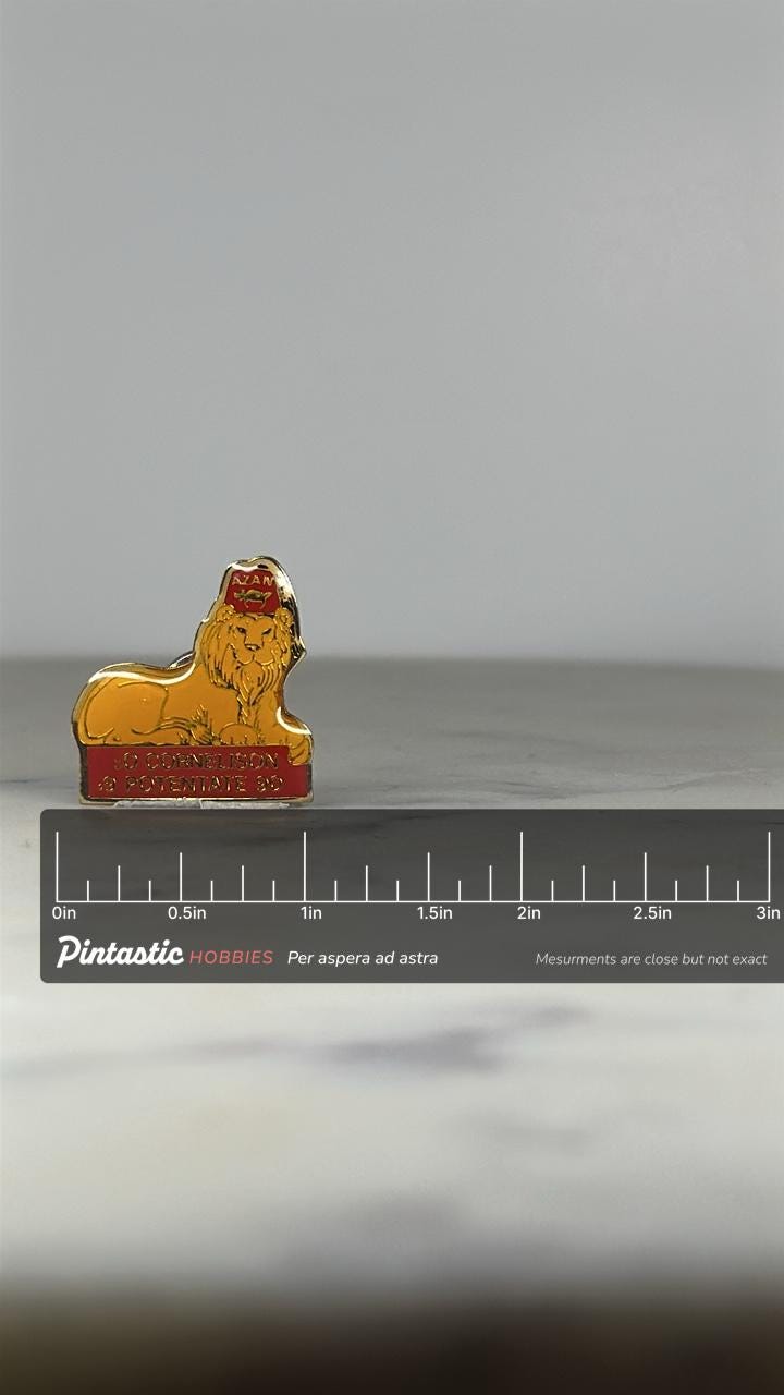 Shriners Lion Enamel Pin: Gold & Red Hard Enamel - 1990 Fraternal Accessory with ruler overlay for size reference