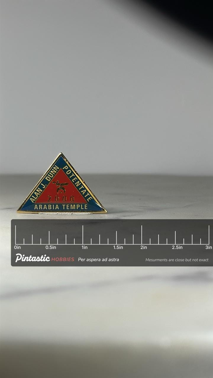 Arabia Temple Potentate Pin: Red & Blue Enamel Triangle - 2000 Fraternal Accessory with ruler overlay for size reference