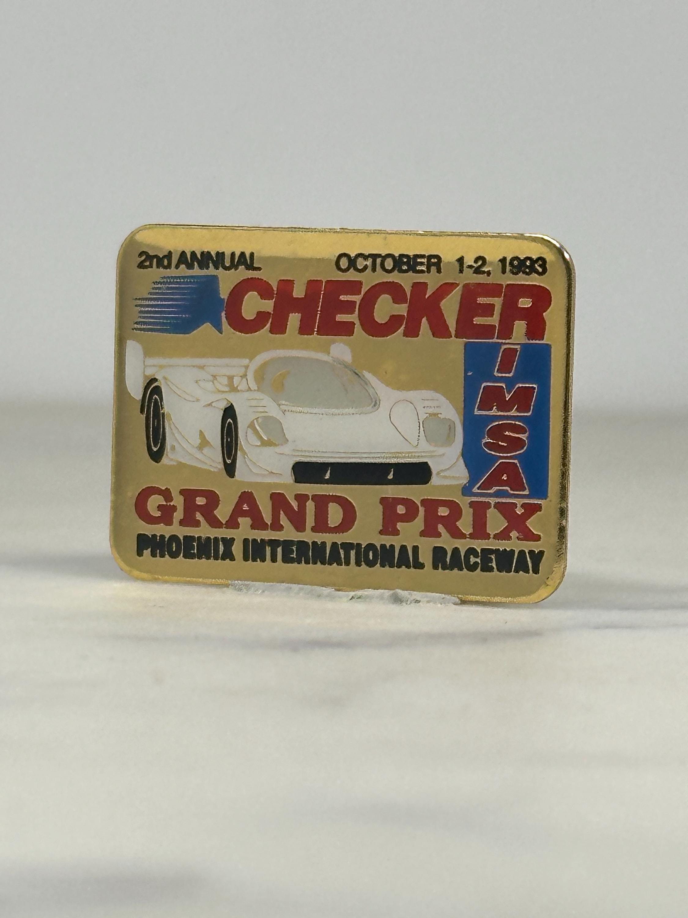 Checker Grand Prix Racing Pin: Gold & Multicolor - 1983 IMSA Accessory