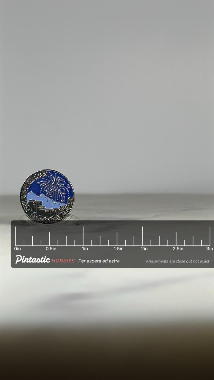 Fur Rendezvous Anchorage Pin: Blue & Silver Enamel - Millennium Festival Accessory with ruler overlay for size reference
