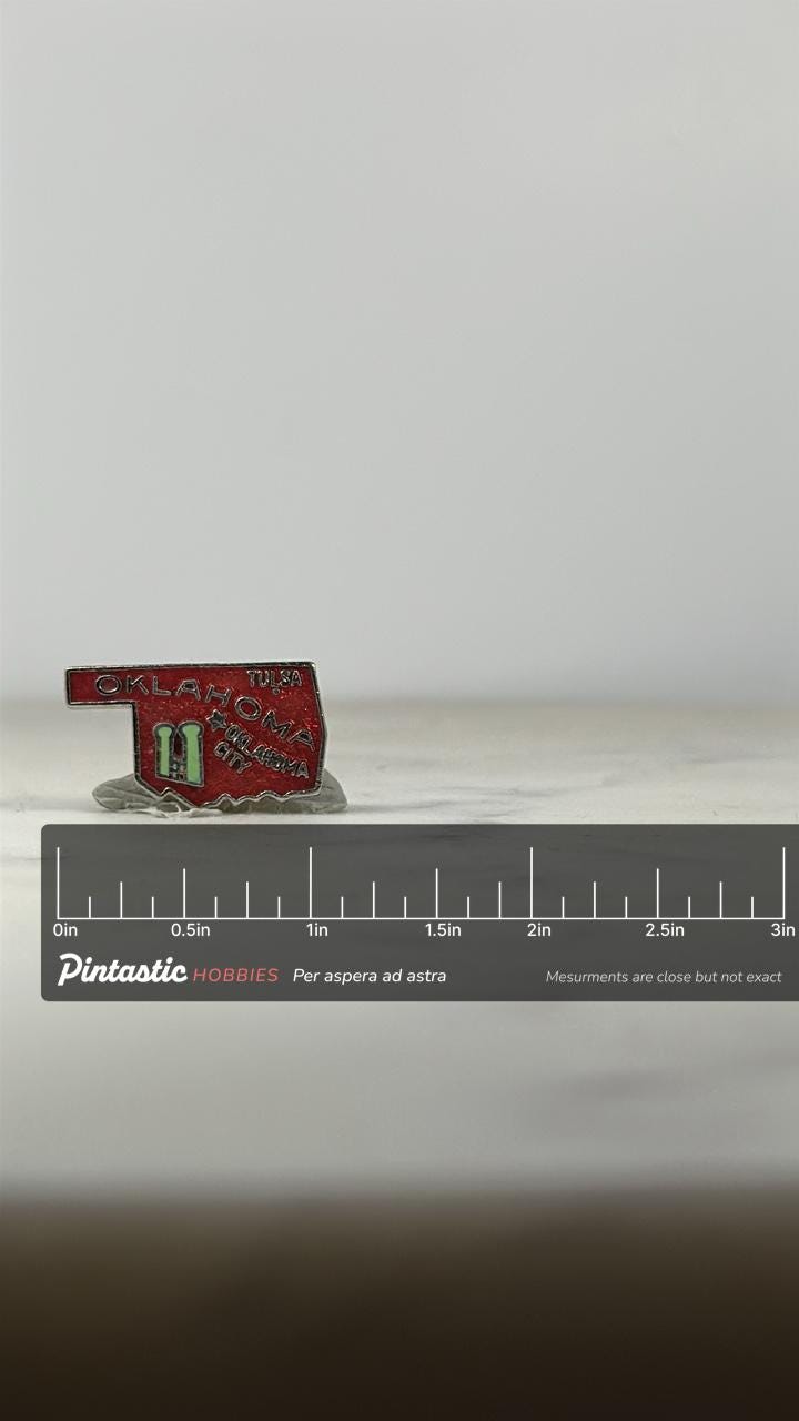Oklahoma Souvenir Enamel Pin: Red Map Design - Vintage Travel Accessory with ruler overlay for size reference