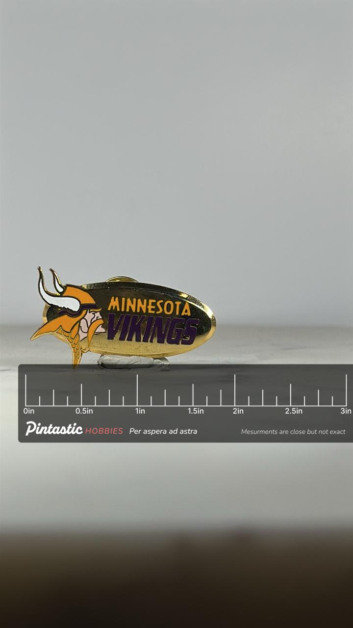 Minnesota Vikings Enamel Pin: Gold & Purple Finish - Vintage Sports Accessory with ruler overlay for size reference